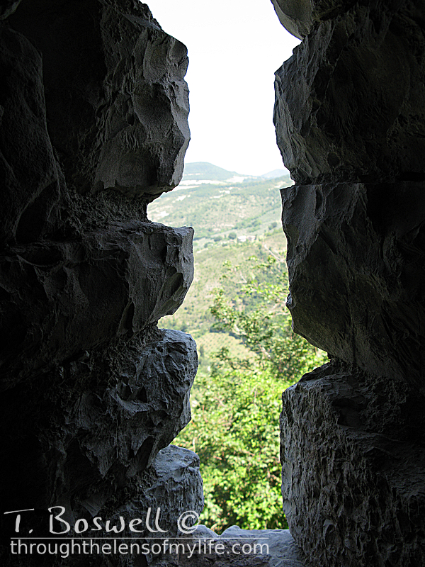 IMG-1245-3-dark-light-looking-out-fortress-wall-rocca-maggiore-assisi-3x4-terry-boswell-wm
